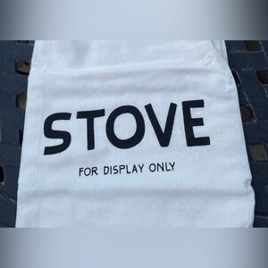 NWT. Primitives by Kathy White Towel with Black Text